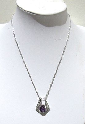 STUNNING STERLING SILVER NECKLACE AND PENDANT WITH AMETHYST CRYSTAL.