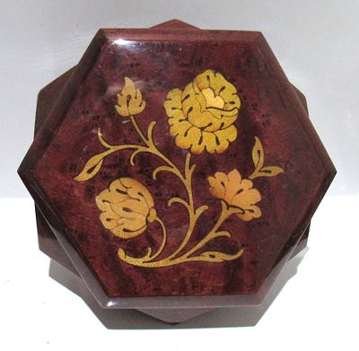 BIN PRICE $10. DECORATIVE MUSIC BOX. REUGE SWITZERLAND PLAYS "SOMEWHERE MY LOVE". WORKING. 