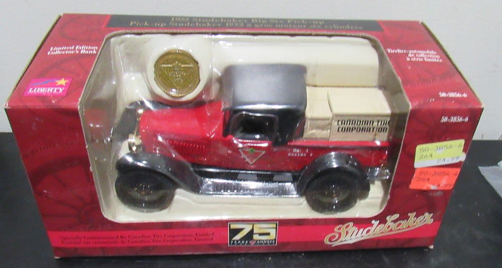 BIN $10. CANADIAN TIRE 75TH ANNIVERSARY STUDEBAKER TRUCK BANK.