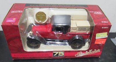 BIN $10. CANADIAN TIRE 75TH ANNIVERSARY STUDEBAKER TRUCK BANK.