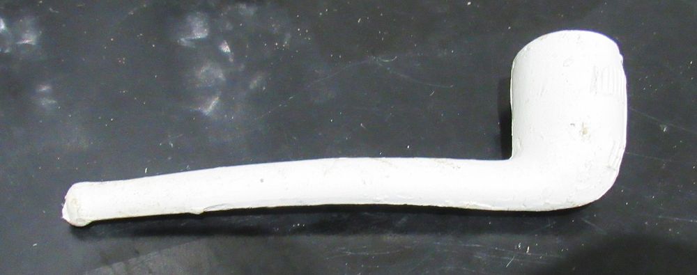 BIN PRICE $10. ANTIQUE CLAY PIPE WITH AIRPLANE ON BOWL.