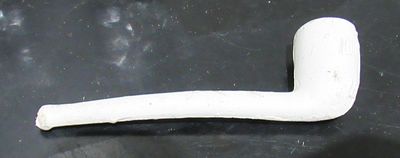 BIN PRICE $10. ANTIQUE CLAY PIPE WITH AIRPLANE ON BOWL.