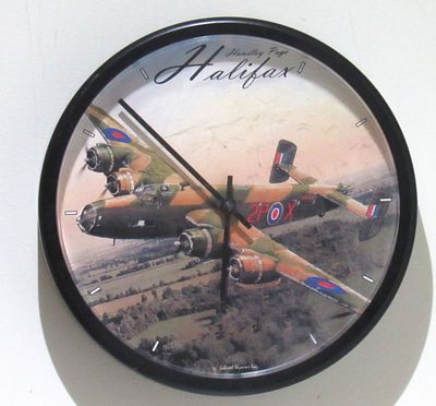 BIN PRICE $10. MILITARY AIRPLANE-HALIFAX CLOCK. WORKING. SURFACES SCRATCHES (NOTHING SERIOUS).