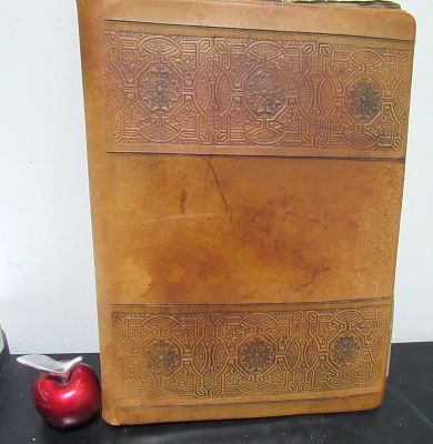 BIN PRICE $10. HANDTOOLED LEATHER VALET .