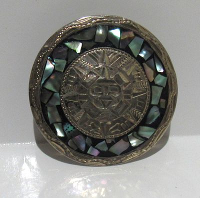 BIN PRICE $25. AZTEC/MAYAN WITH MOP STERLING SILVER BROOCH/PENDANT.