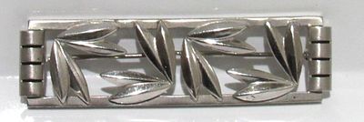 SOLD SOLD SOLD WITH BIN PRICE $20. MCM MODERNIST STERLING SILVER BROOCH.