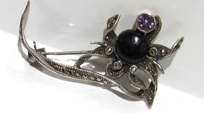 BIN PRICE $20. STERLING SILVER BROOCH WITH AMETHYST GEMSTONE/ONYX CABOCHON//MARCASITES.