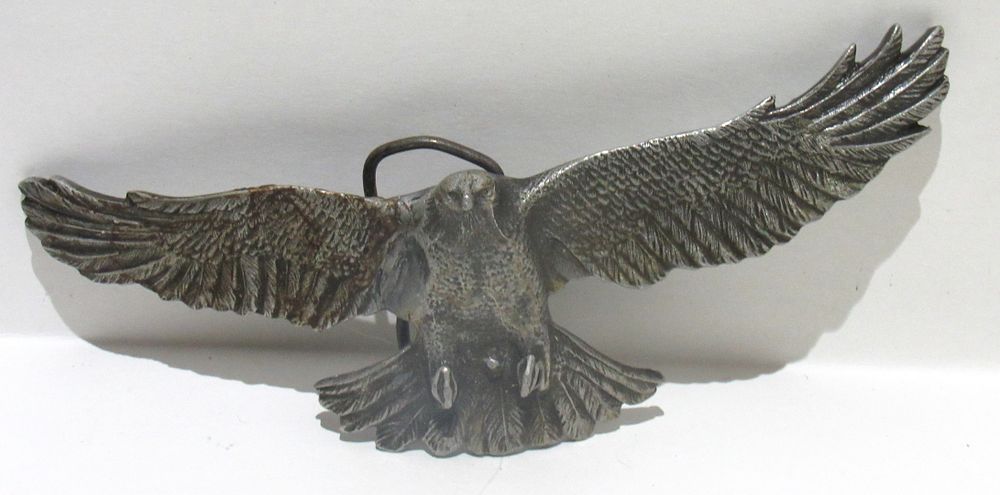 Lot 237: BIN PRICE $10. SIGNED BELT BUCKLE. NOTE REPAIR.