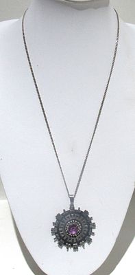SIGNED MEXICAN STERLING SILVER PENDANT AND CHAIN WITH AMETHYST GEMSTONE.