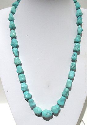 ASIAN HANDKNOTTED BAROQUE GRADUATED TURQUOISE NECKLACE.COMES WITH ORIGINAL BIRK"S BOX. OVERALL 