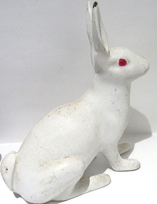 ANTIQUE CAST IRON BUNNY RABBIT DOOR STOP. VERY HEAVY.