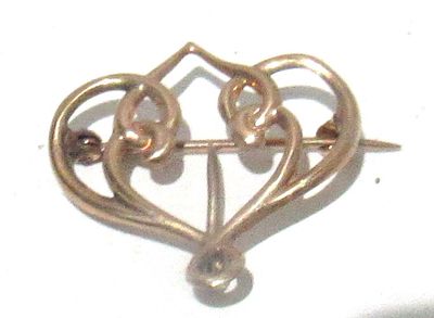 EDWARDIAN 10KT GOLD ART NOUVEAU BROOCH.