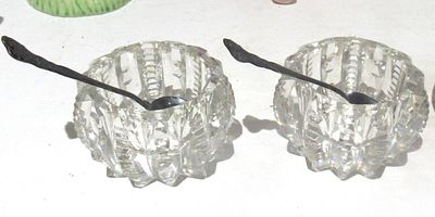LATE VICTORIAN/EDWARDIAN MATCHED CUT CRYSTAL SALTERS WITH STERLING SILVER SPOONS.