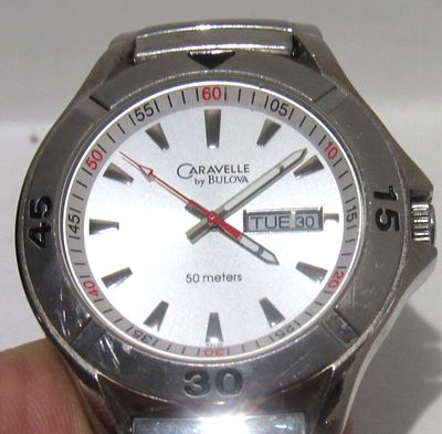 CARAVELLE BY BULOVA MAN'S WATCH. WORKING-NEW BATTERY.