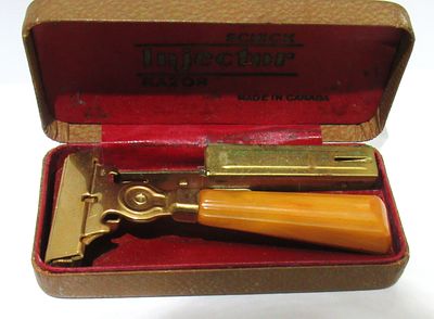 BUY-IT-NOW PRICE $20. SCHICK INJECTOR RAZOR IN ORIGINAL BOX. BUTTERSCOTH BAKELITE HANDLE.