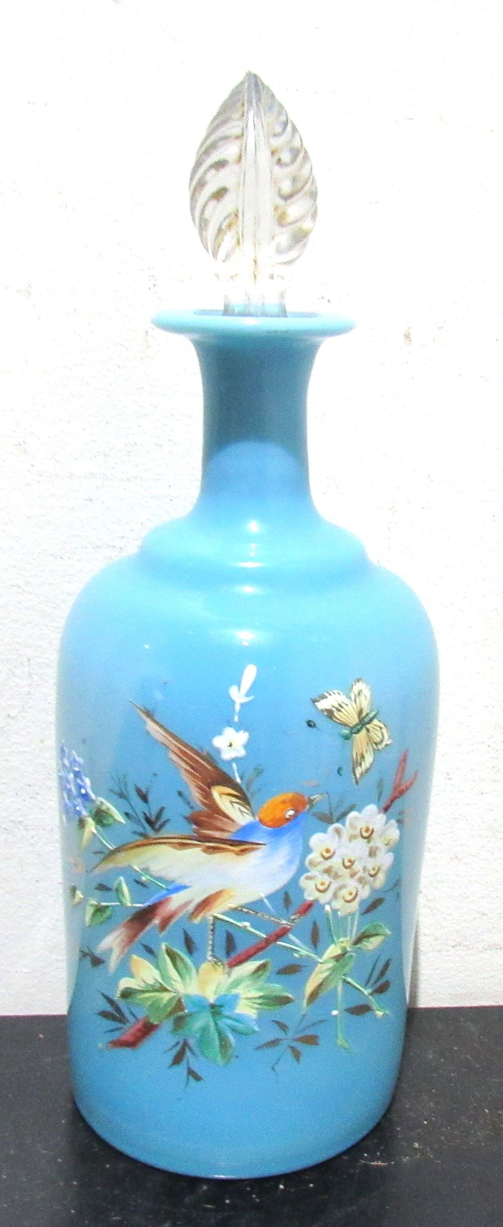 Lot 547: BUY-IT-NOW PRICE $20.. ANTIQUE FRENCH HANDPAINTED OPALINE DRESSER BOTTLE. MINOR ROUGHAGE TO TIP OF STOPPER.