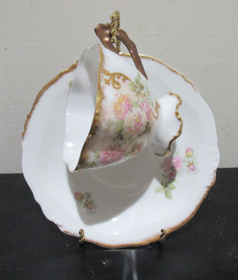 Lot 567: BUY-IT-NOW PRICE $20. FANCY LIMOGES FRANCE CABINET CUP & SAUCER. STAND NOT INCLUDED.