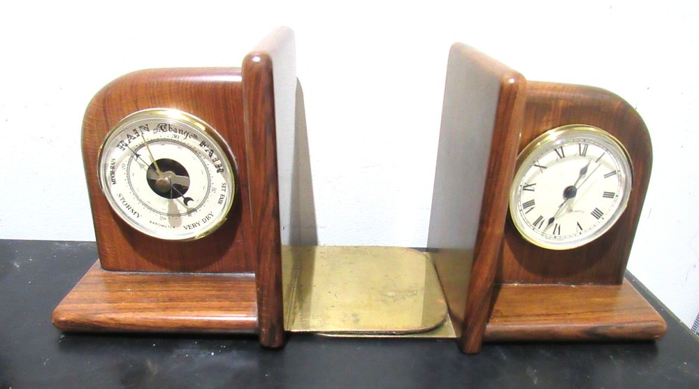Lot 573: RETRO BOOKENDS. BAROMETER WORKING. CLOCK REQURES NEW BATTERY.