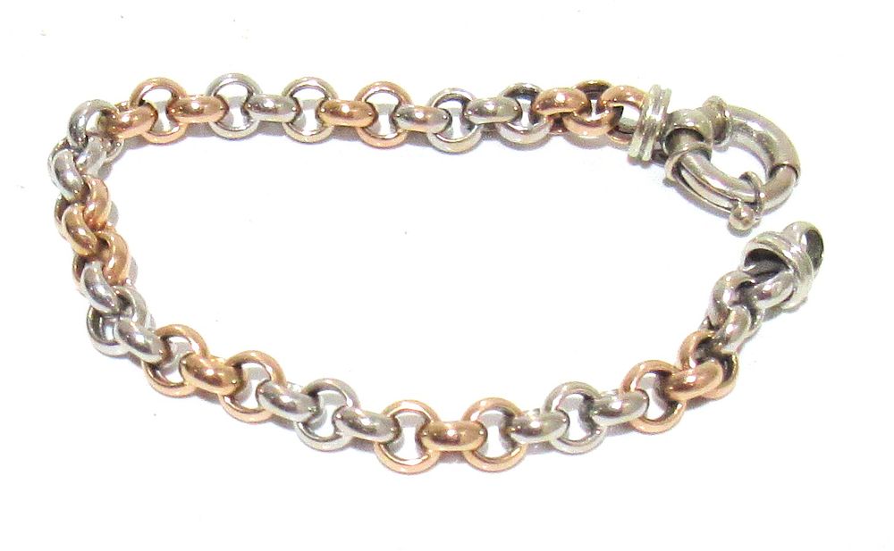 Lot 580: BUY-IT-NOW PRICE $1,195 14KT YELLOW & WHITE GOLD BRACELET. 7" OVERALL LENGTH. 11.1 GRAMS.