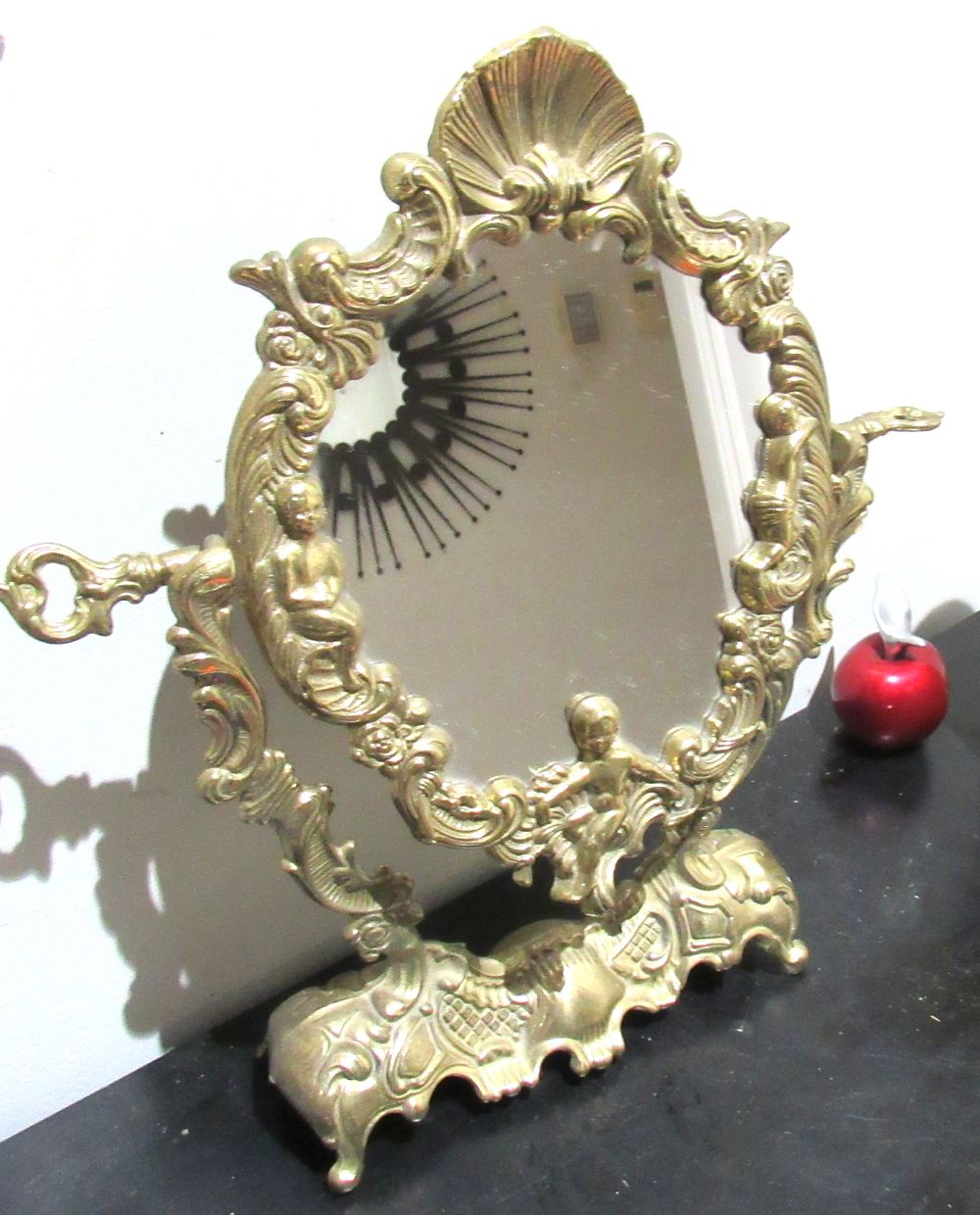Lot 602: BUY-IT-NOW PRICE $45. VINTAGE SOLID BRASS MADE IN ITALY DRESSER MIRROR WITH PUTTI..