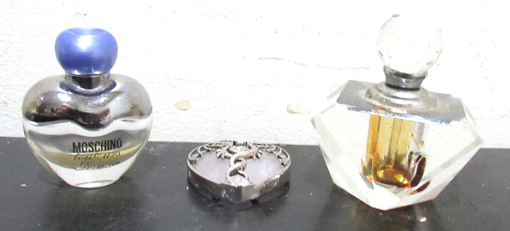 Lot 622: BUY-IT-NOW PRICE $10. 3 PC. LOT. 2 PERFUME BOTTLES AND ONE COSTUME PENDANT. ALL FOR ONE BID.