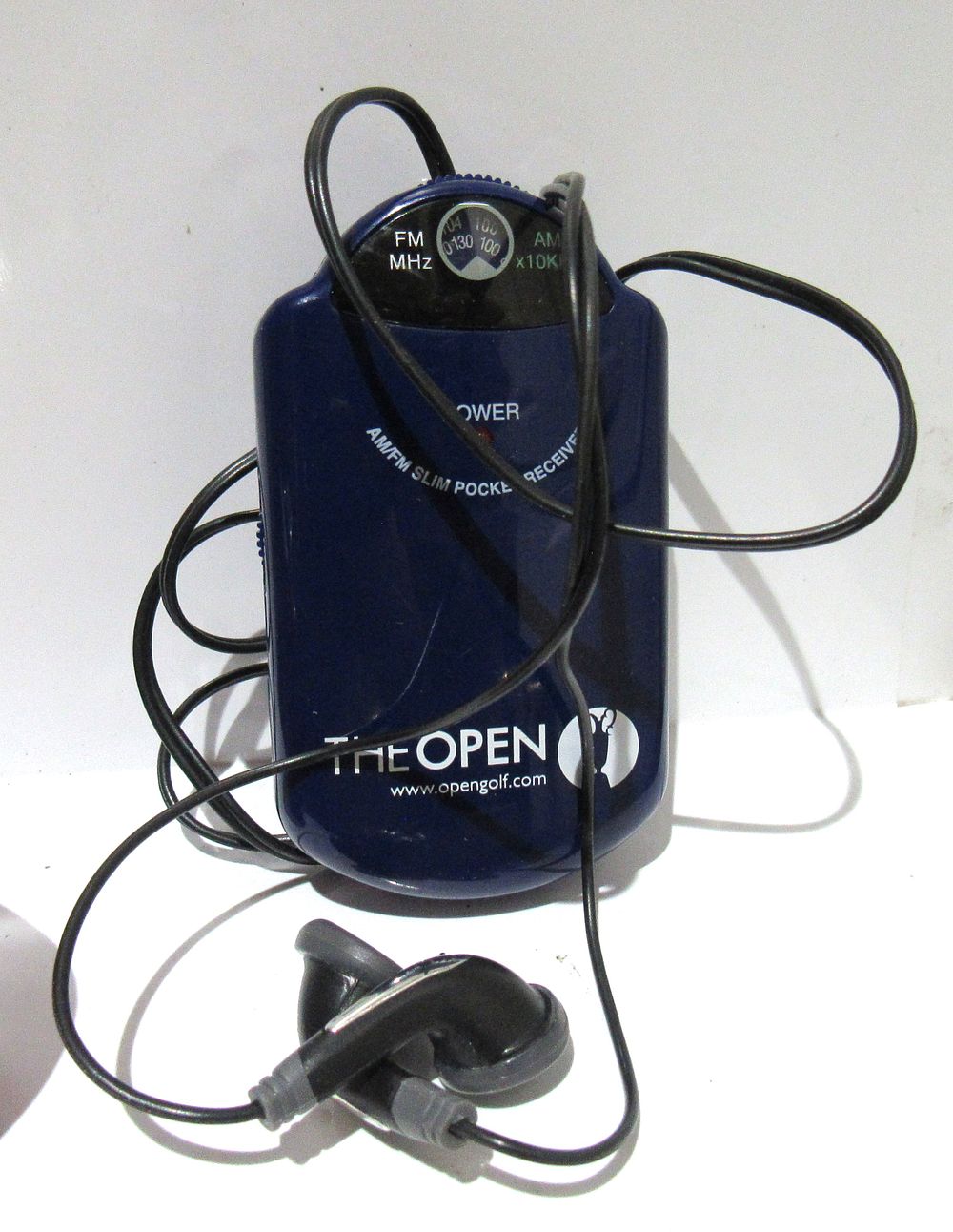 Lot 641: BUY-IT-NOW PRICE $20. BRITISH OPEN AM/FM RADIO WITH ORIGINAL BOX. TESTED, WORKING. COMES WITH BATTERY.