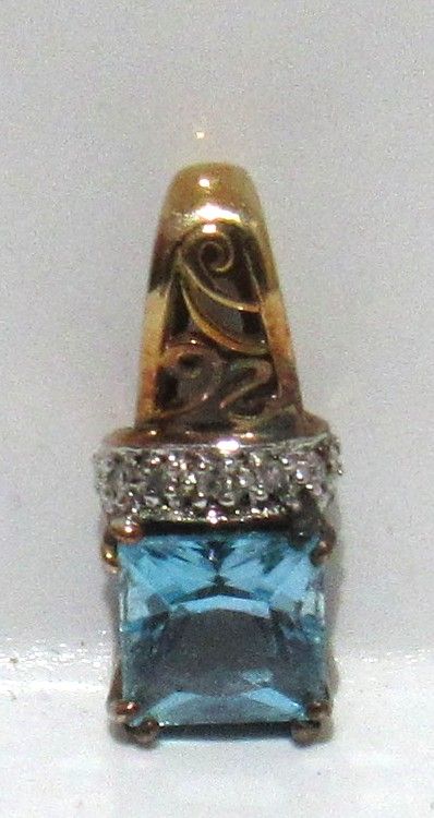 Lot 644: BUY-IT-NOW PRICE $150. DAINTY 10KT GOLD AQUAMARINE PENDANT,