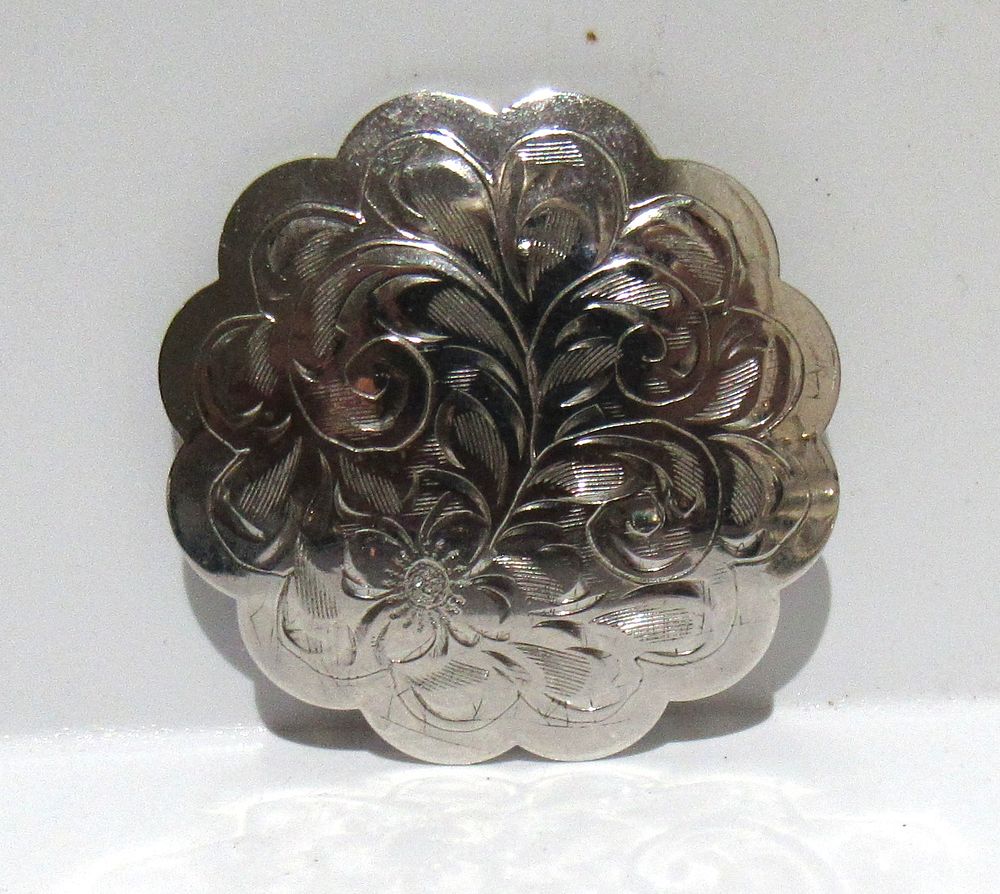 Lot 652: BUY-IT-NOW PRICE $45. STERLING SILVER BROOCH.