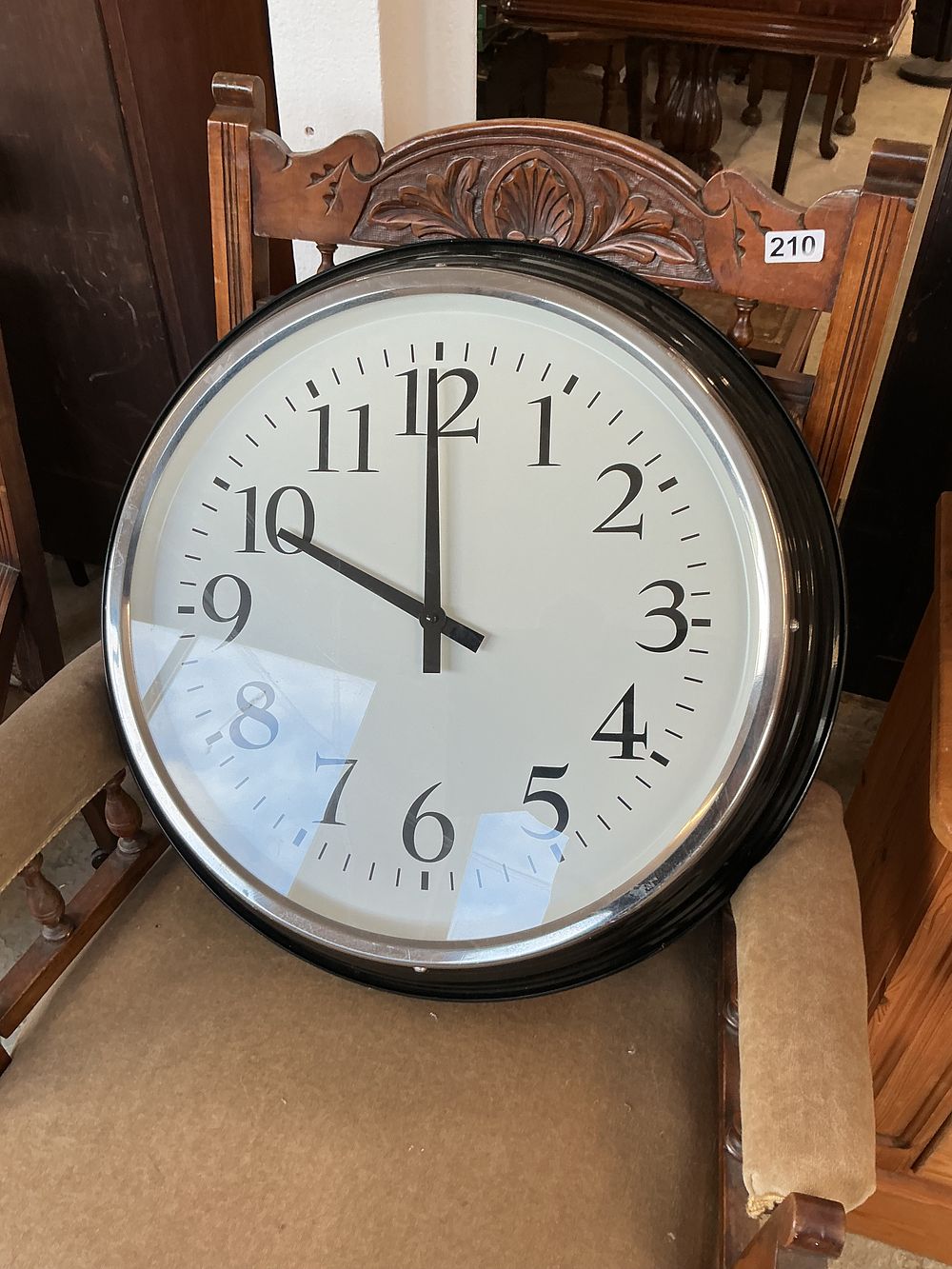 Lot 231: A Large Black Wall Clock Attributed to IKEA Bravur