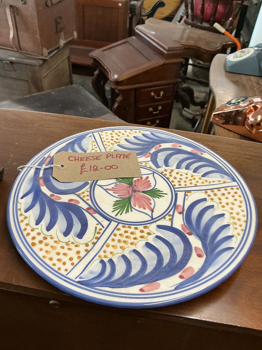 Lot 253: A Spanish Hand-Painted Tin-Glazed Earthenware Cheese Plate