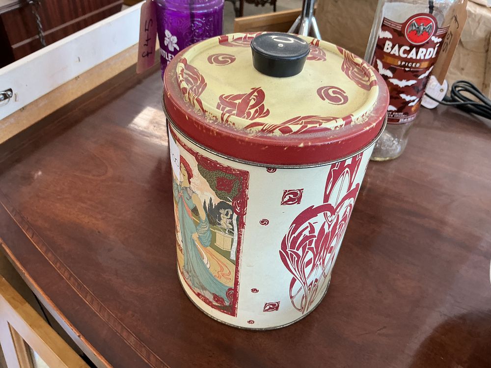 Lot 295: An Art Nouveau Style Lithographed Metal Canister