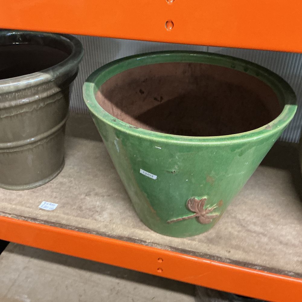 Lot 334: A Large Green Glazed Terracotta Garden Planter with Dragonfly Relief