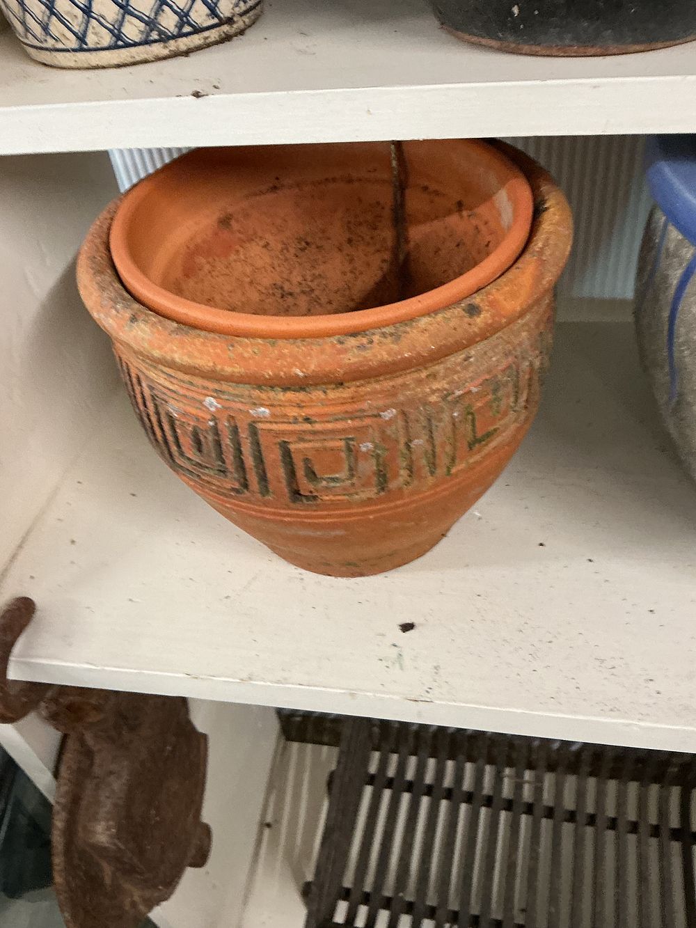 Lot 359: A Neoclassical Style Terracotta Garden Planter and Liner with Greek Key Decoration
