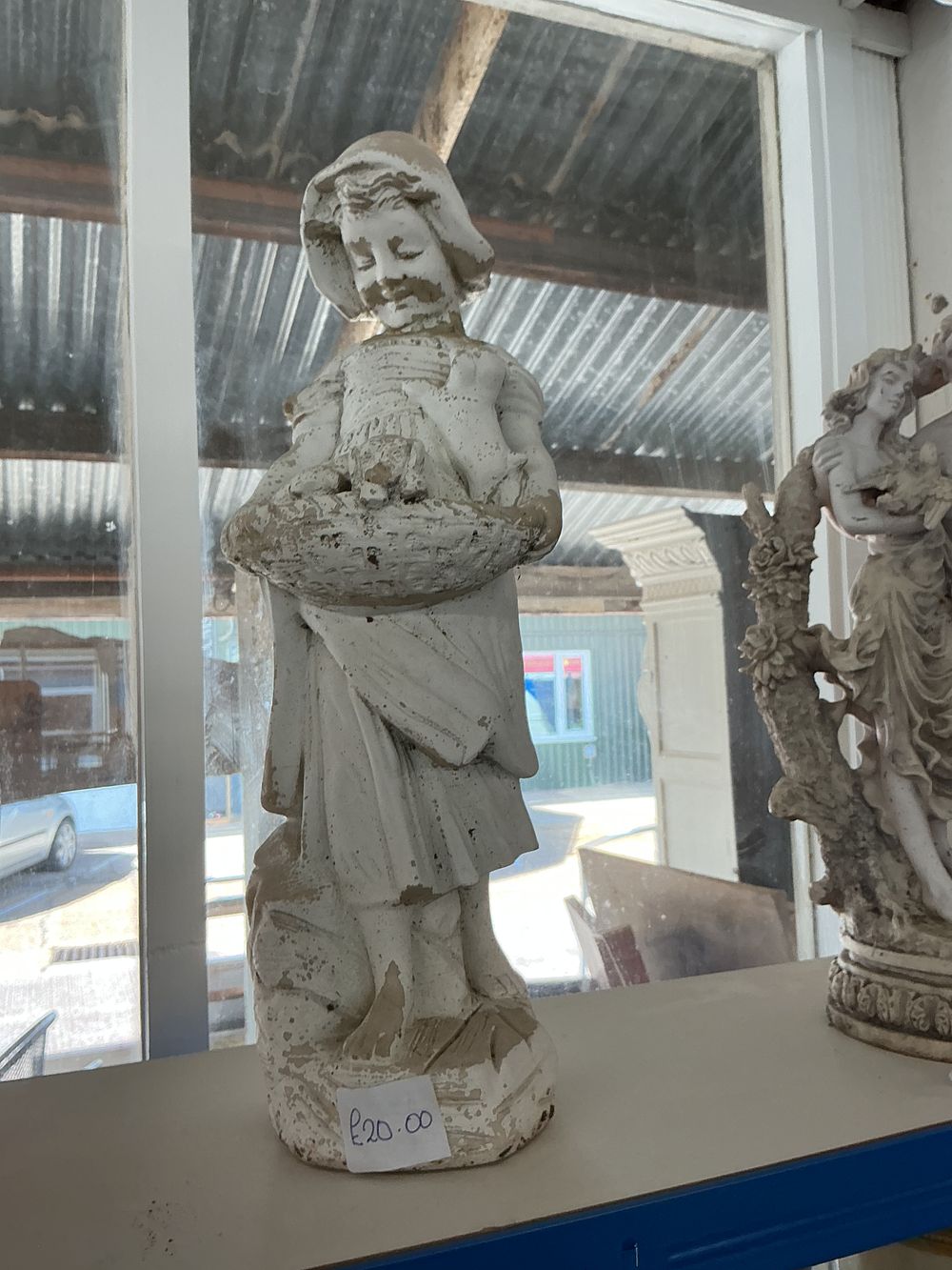 Lot 377: Two Cast Composition Figures
