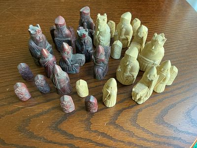 An Assortment of Isle of Lewis Style Replica Chess Pieces. An assortment of replica chess pieces 