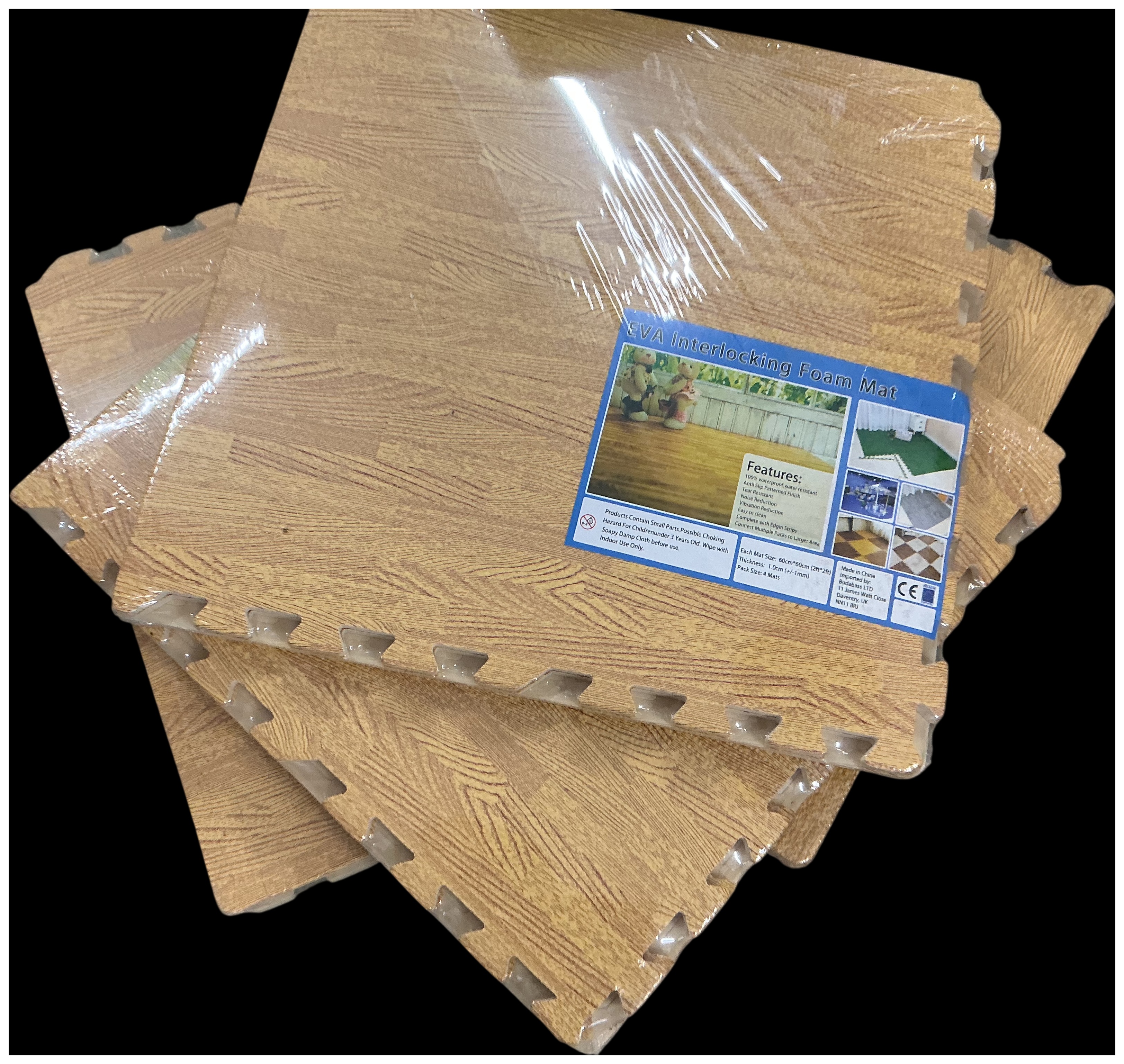 A Set of Four Packs of Wood Grain Effect Interlocking EVA Foam Floor Mats