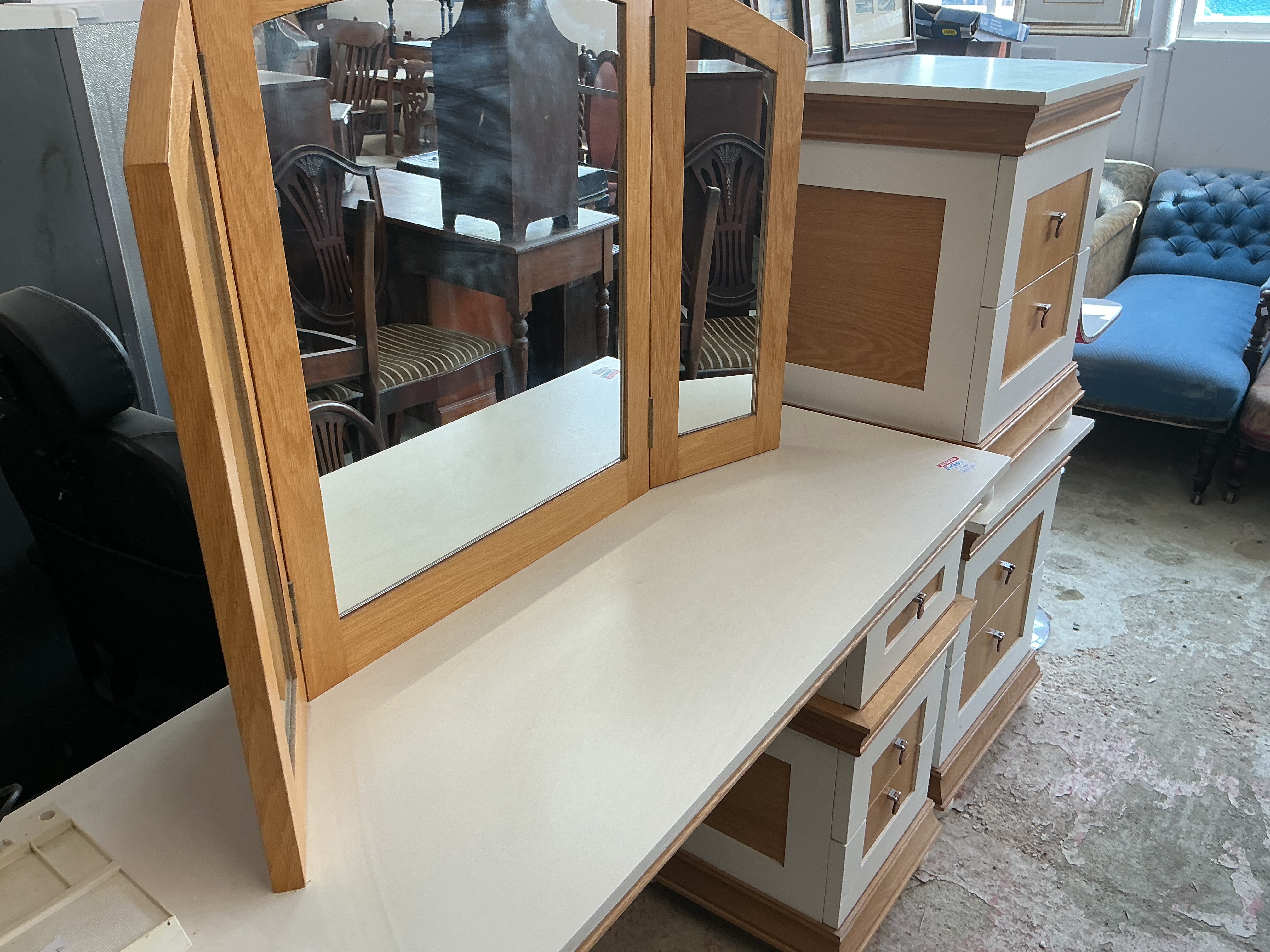 A Pair of Contemporary Two-Tone Bedroom Furniture Pieces Comprising a Dressing Table and Chest of Drawers