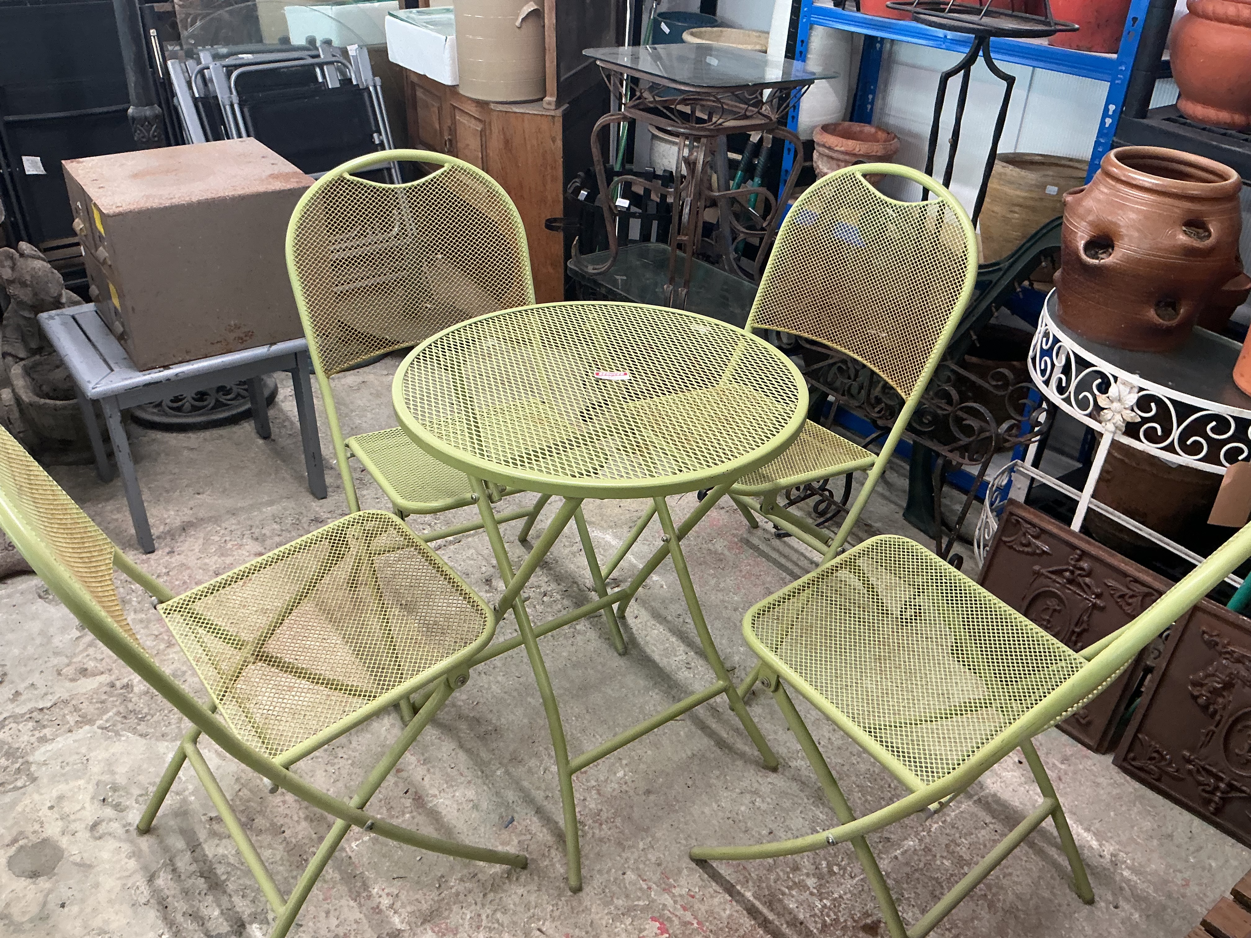 A Five-Piece Folding Metal Mesh Garden Bistro Set