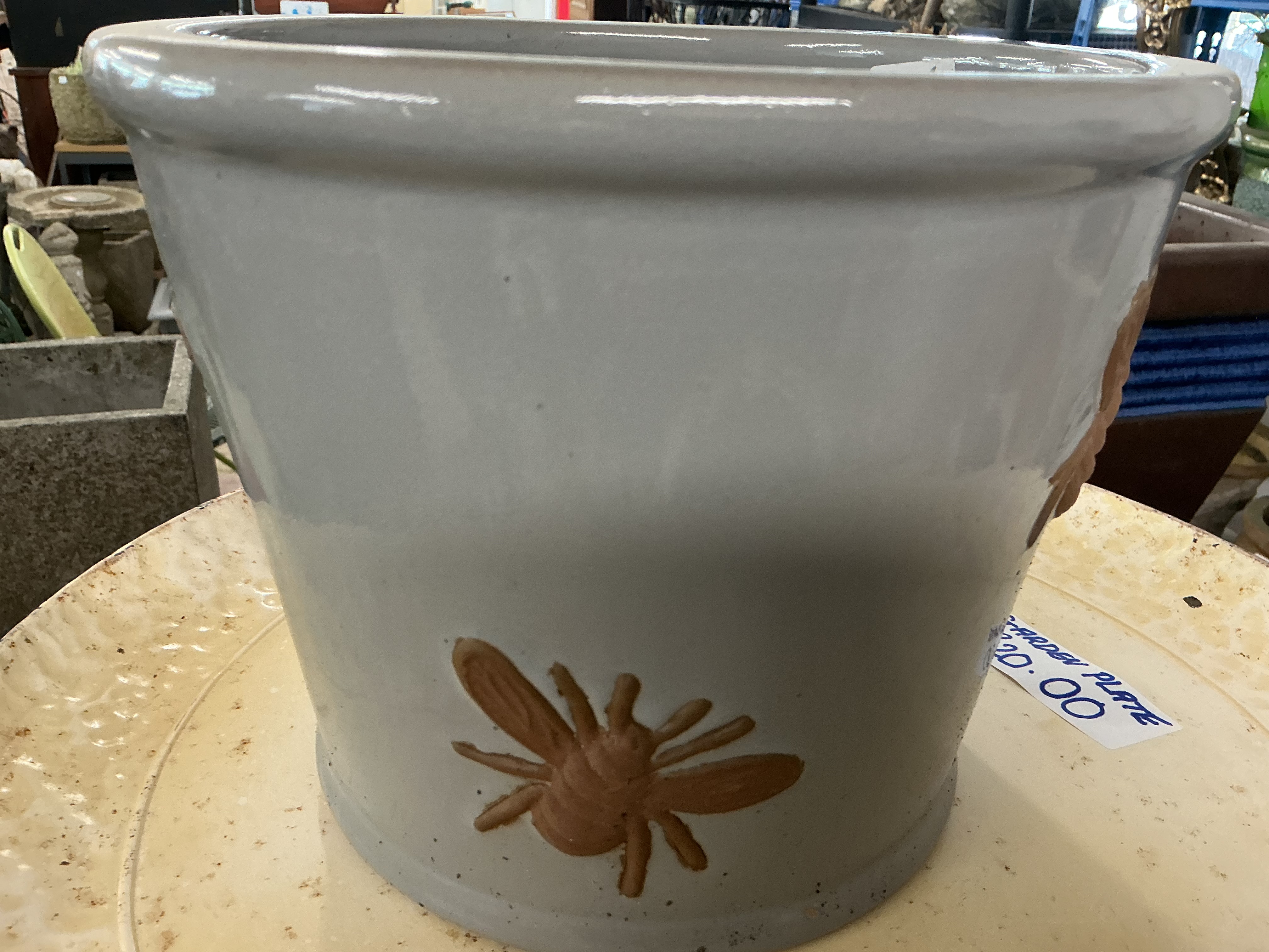A Large Glazed Ceramic Garden Planter with Relief Bee Decoration