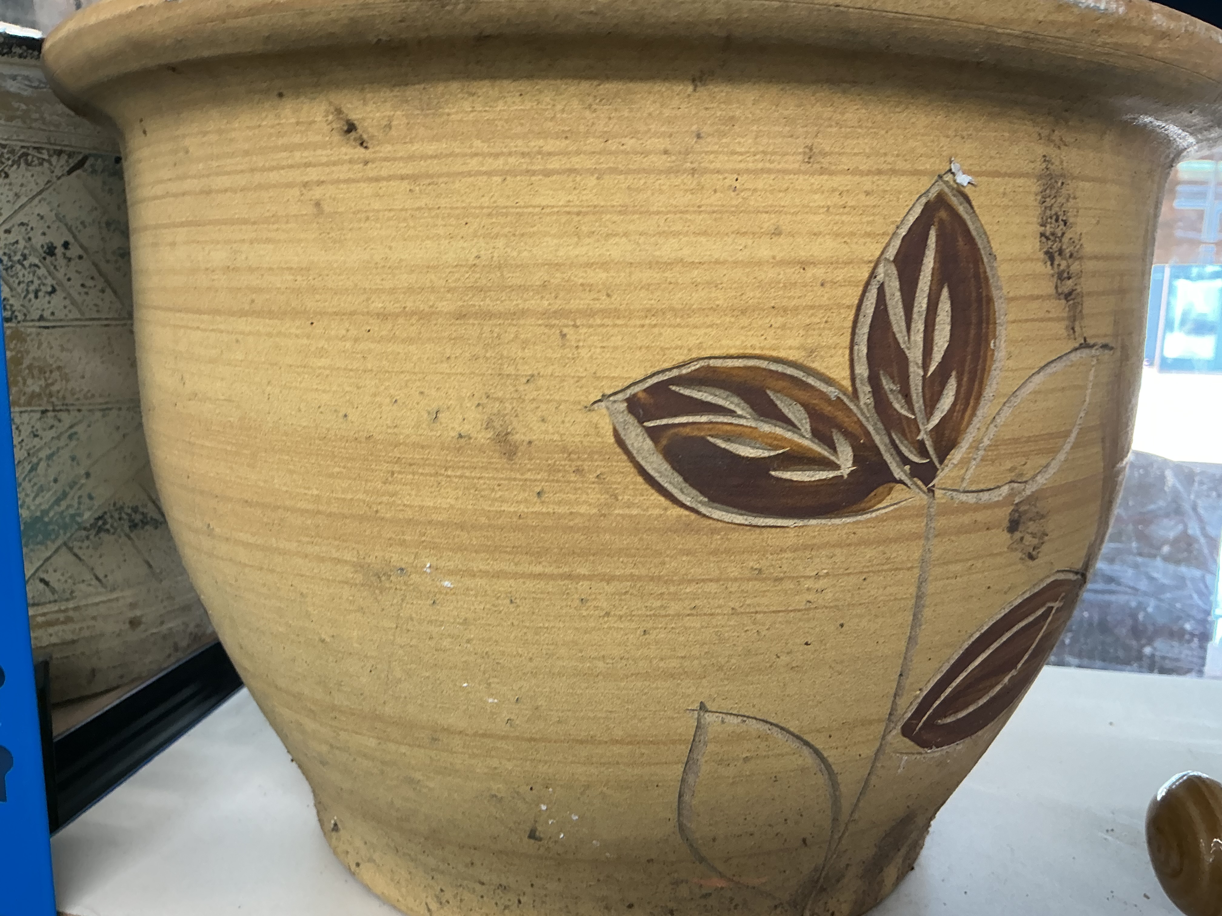 Large stoneware garden planter with sgraffito foliate decoration