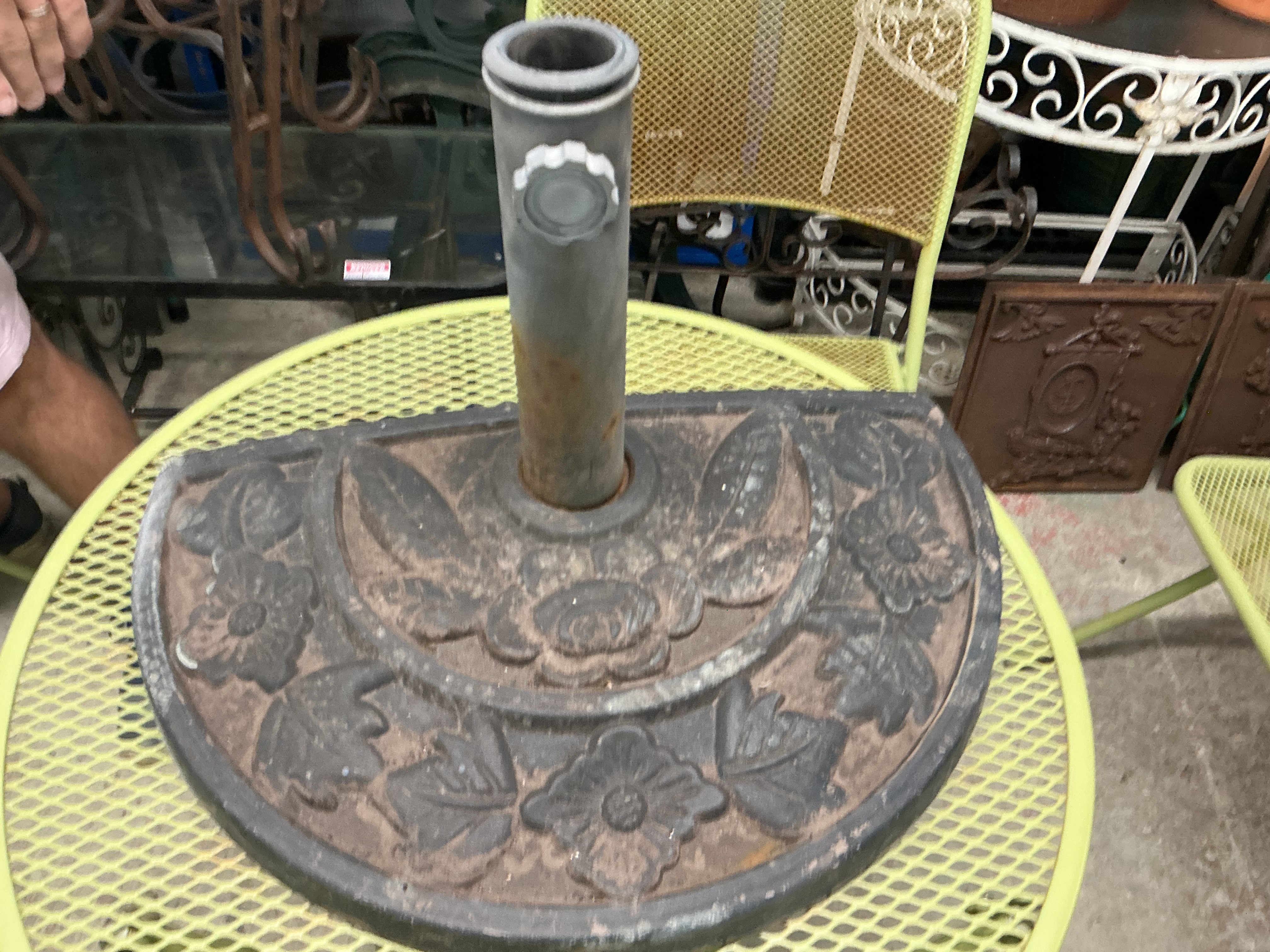 A Decorative Cast Metal Half-Round Parasol Base