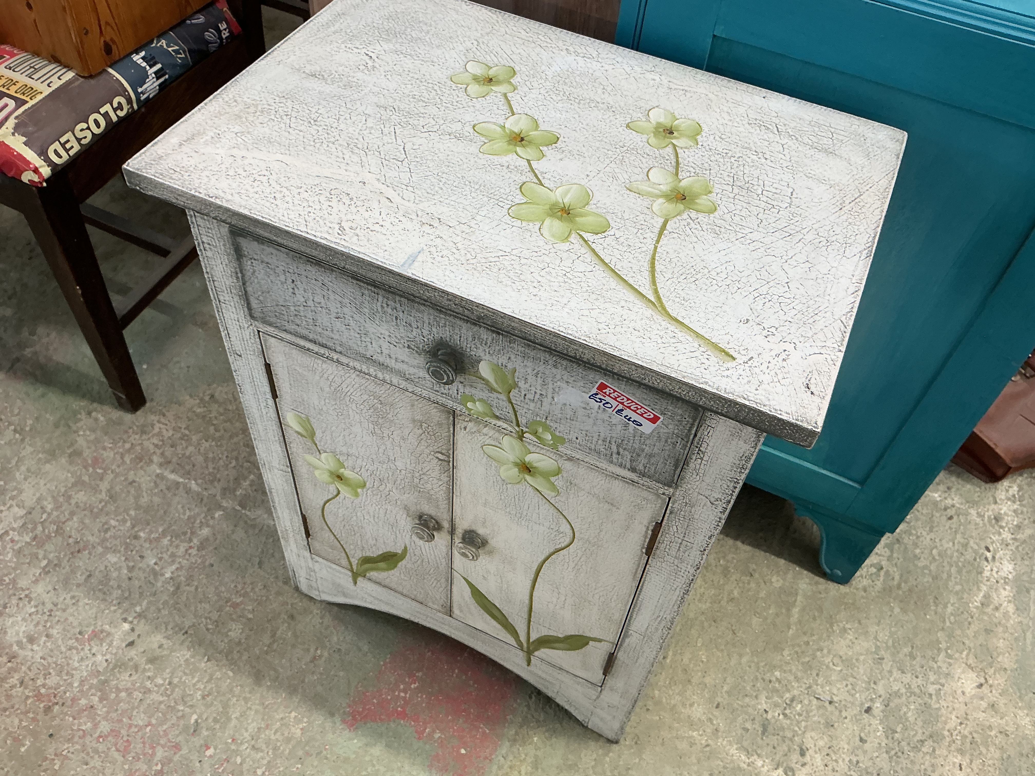 A Shabby Chic Distressed White Painted Floral Decorative Side Cabinet