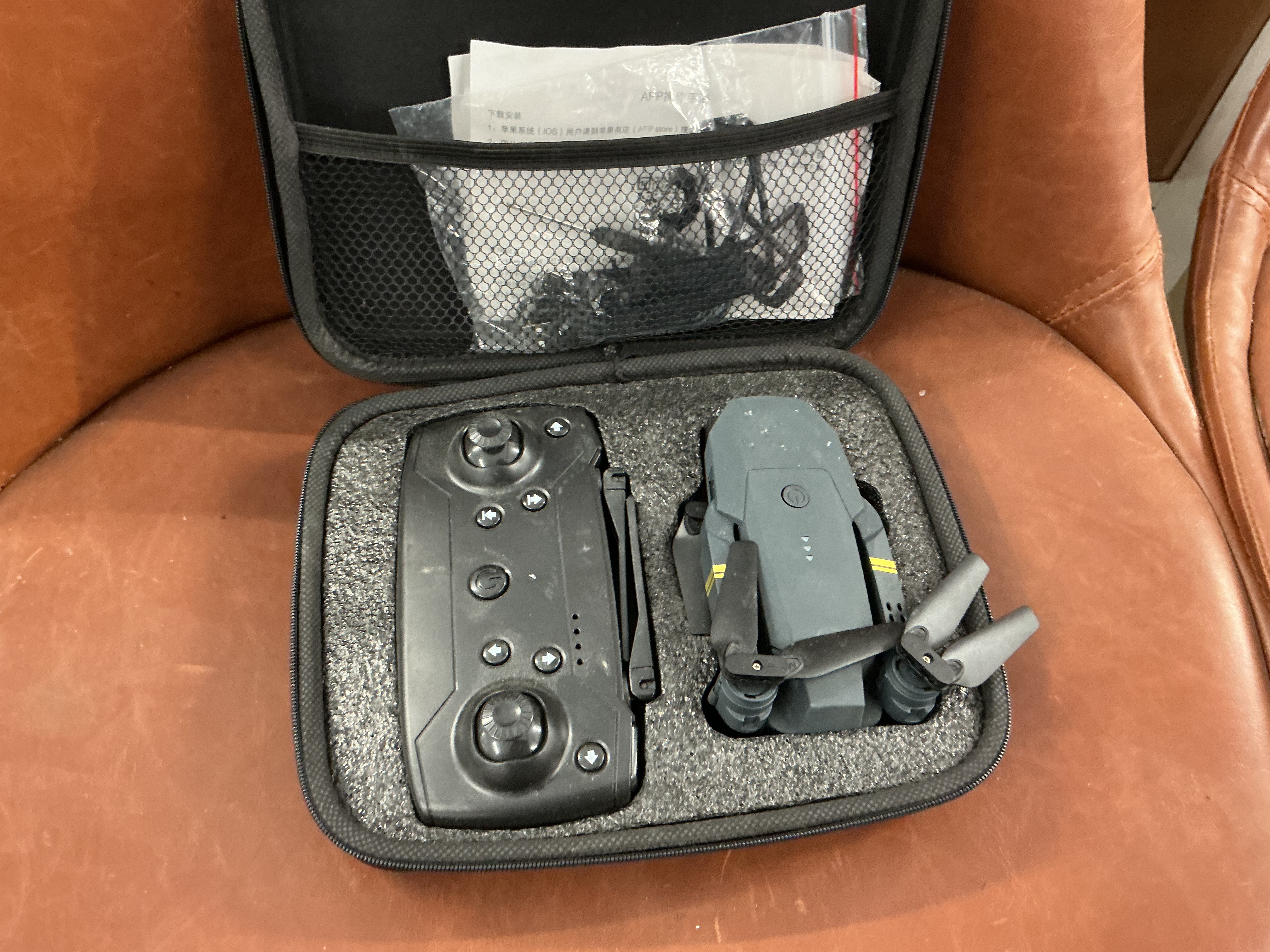 A Foldable Quadcopter Drone and Remote Controller Set in Carrying Case