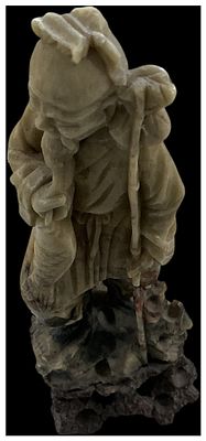 Chinese Carved Soapstone Figure of a Fisherman. A Chinese hand-carved soapstone figurine 