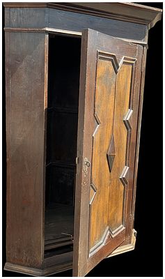 17th Century Style Oak Hanging Corner Cupboard with Geometric Panel. A single-door hanging 