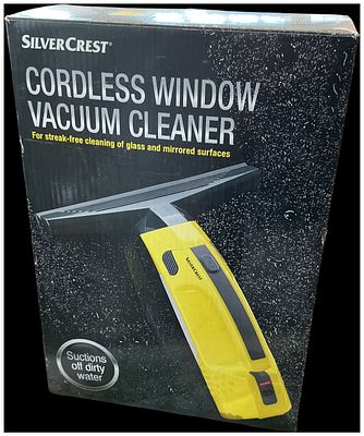 SilverCrest Cordless Window Vacuum Cleaner. A SilverCrest cordless window vacuum cleaner, housed 