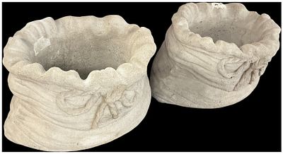A Pair of Cast Stone Garden Planters in the Form of Sacks. A pair of garden planters crafted 