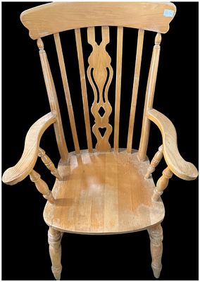 A Vintage Spindle-Back Wooden Armchair in the Captain's Style. This single chair is constructed 