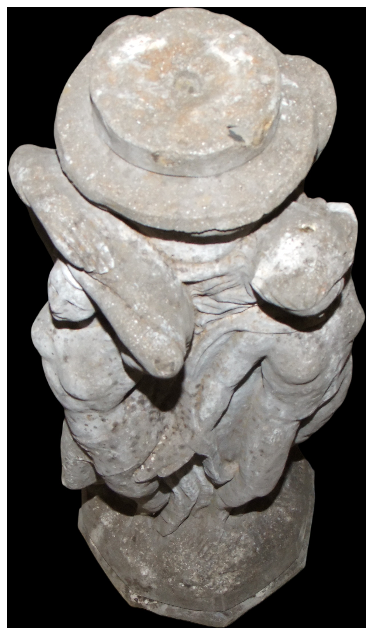 A Weathered Cast Stone Garden Pedestal Decorated with Three Putti