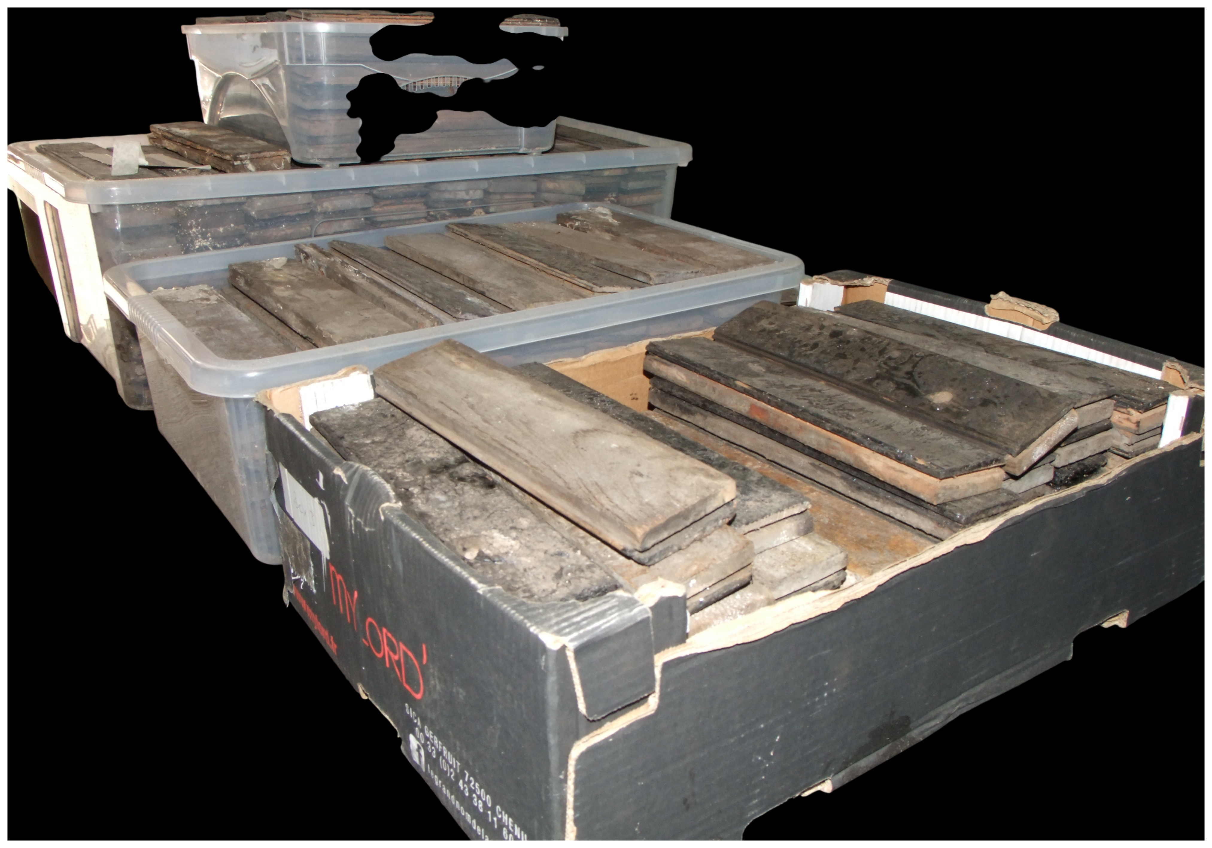 A Collection of Reclaimed Hardwood Parquet Flooring Blocks